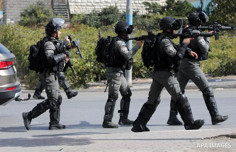 Palestinian protesters clash with Israeli forces following a demonstration calling for the release of Palestinian prisoners on hunger strike in Israeli jails, in the West Bank city of Hebron on October 24, 2021. Seven Pa...