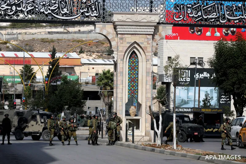 Palestinian protesters clash with Israeli forces following a demonstration calling for the release of Palestinian prisoners on hunger strike in Israeli jails, in the West Bank city of Hebron on October 24, 2021. Seven Pa...
