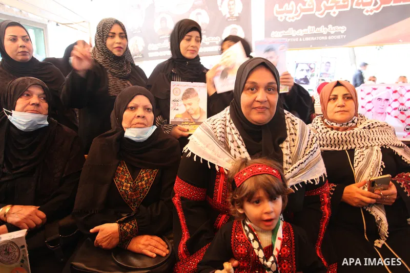 Palestinians take part in a protest in solidarity with prisoners on hunger strike at Israeli jails, in front of Red Cross office in Gaza city on October 25, 2021. Photo by Youssef Abu Watfa