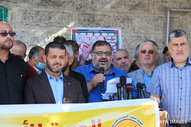 Palestinians take part in a protest in solidarity with prisoners on hunger strike at Israeli jails, in front of Red Cross office in Gaza city on October 25, 2021. Photo by Youssef Abu Watfa