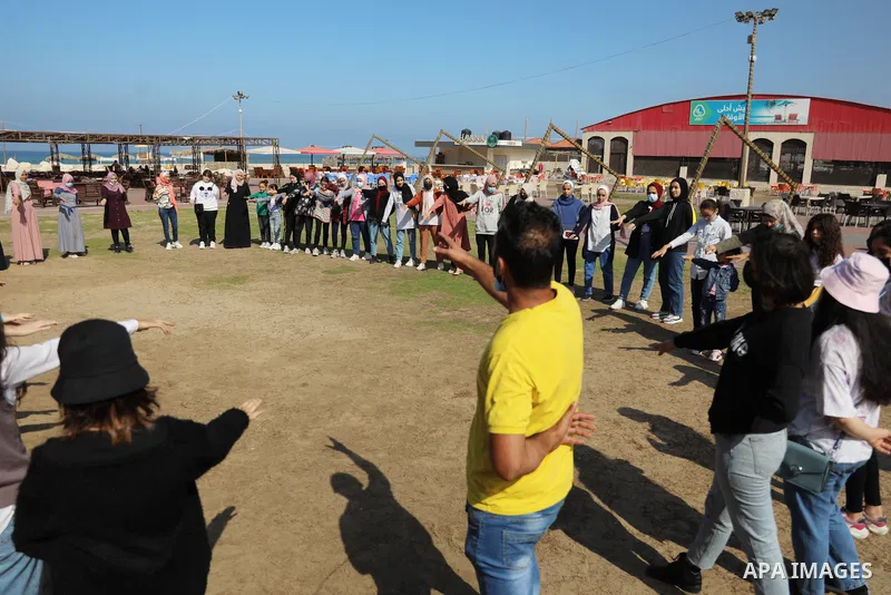 Palestinian girls take part in a fun activity, marking the international day of the girl in Gaza city, on October 25, 2021. The International Day of the Girl Child focuses attention on the need to address the challenges...