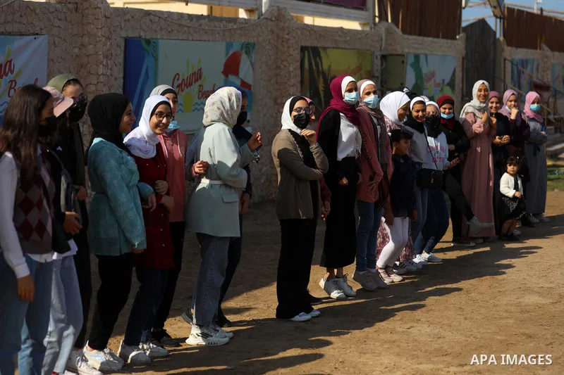Palestinian girls take part in a fun activity, marking the international day of the girl in Gaza city, on October 25, 2021. The International Day of the Girl Child focuses attention on the need to address the challenges...