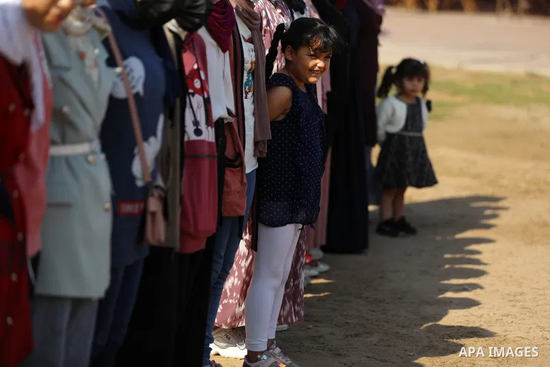 Palestinian girls take part in a fun activity, marking the international day of the girl in Gaza city, on October 25, 2021. The International Day of the Girl Child focuses attention on the need to address the challenges...