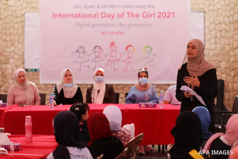 Palestinian girls take part in a fun activity, marking the international day of the girl in Gaza city, on October 25, 2021. The International Day of the Girl Child focuses attention on the need to address the challenges...