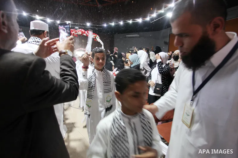 Palestinian children participate in a ceremony to honor the memorizers of the Holy Koran, in Gaza city on October 25, 2021. Photo by Omar Ashtawy