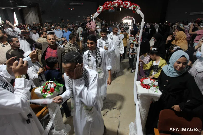 Palestinian children participate in a ceremony to honor the memorizers of the Holy Koran, in Gaza city on October 25, 2021. Photo by Omar Ashtawy