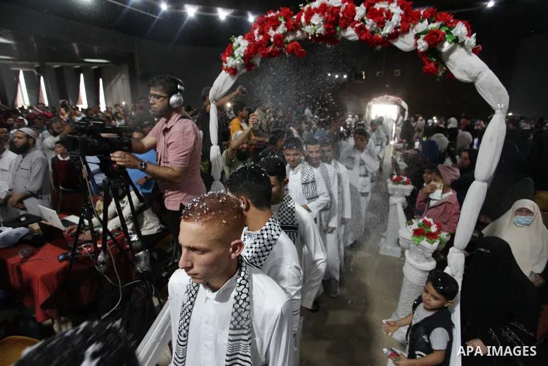Palestinian children participate in a ceremony to honor the memorizers of the Holy Koran, in Gaza city on October 25, 2021. Photo by Omar Ashtawy