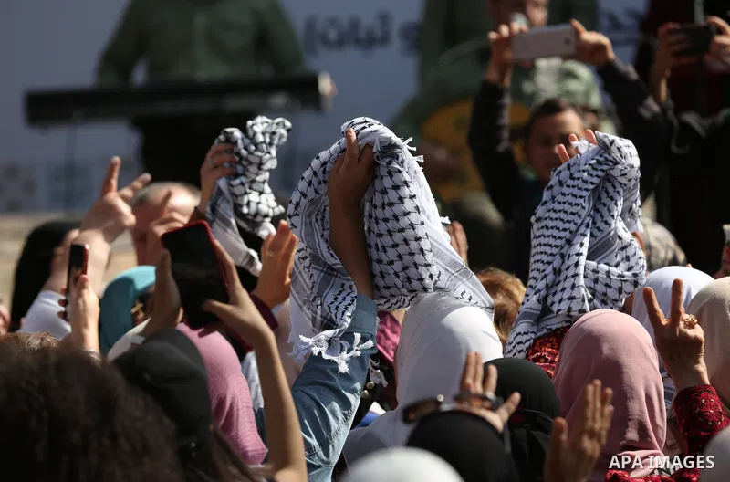 Palestinians attend a festival marking the National Palestinian Women's Day, in the village of Beita in the West Bank city of Nablus on October 26, 2021. Photo by Wajed Nobani