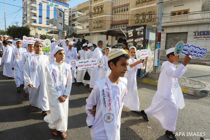 Palestinians participate in a ceremony to honor the memorizers of the Holy Koran, in Gaza city on October 26, 2021. Photo by Omar Ashtawy