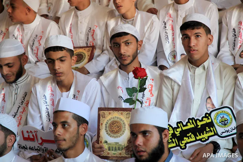 Palestinians participate in a ceremony to honor the memorizers of the Holy Koran, in Gaza city on October 26, 2021. Photo by Omar Ashtawy