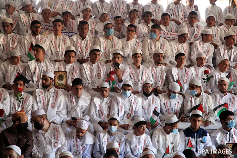 Palestinians participate in a ceremony to honor the memorizers of the Holy Koran, in Gaza city on October 26, 2021. Photo by Omar Ashtawy