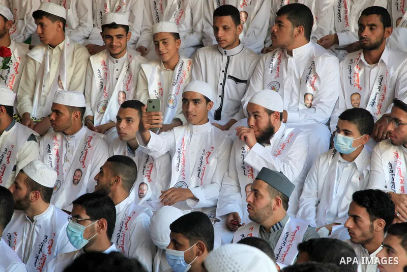 Palestinians participate in a ceremony to honor the memorizers of the Holy Koran, in Gaza city on October 26, 2021. Photo by Omar Ashtawy