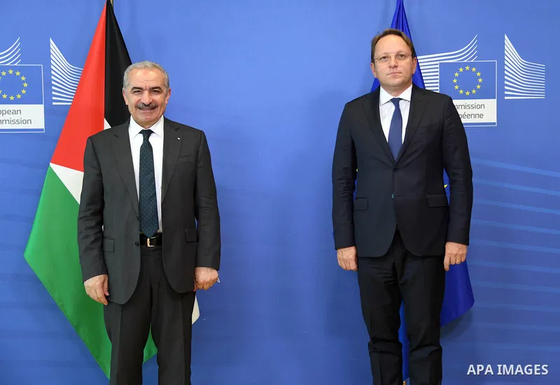 Palestinian Prime Minister Mohammed Ishtayeh meets with Commissioner for European Neighborhood Policy Oliver Varheli, in Brussels, on October 27, 2021. Photo by Prime Minister Office