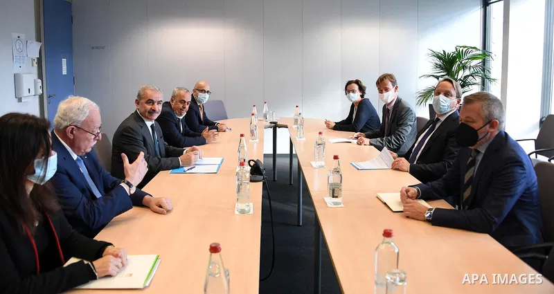 Palestinian Prime Minister Mohammed Ishtayeh meets with Commissioner for European Neighborhood Policy Oliver Varheli, in Brussels, on October 27, 2021. Photo by Prime Minister Office