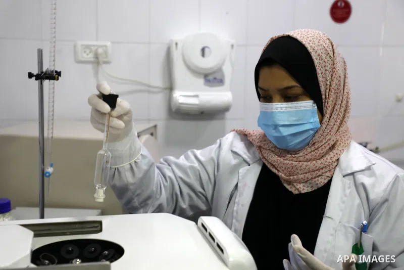 Palestinian employees work at Hanover factory for dairy, in Gaza city, on October 28, 2021. Photo by Majdy Fathi