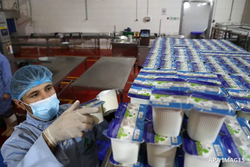 Palestinian employees work at Hanover factory for dairy, in Gaza city, on October 28, 2021. Photo by Majdy Fathi