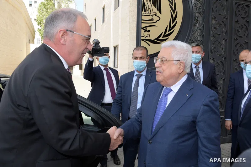 Palestinian president Mahmoud Abbas meets with Swiss Confederation President Guy Parmelin, in the West Bank city of Ramallah on October 28, 2021. Photo by Thaer Ganaim