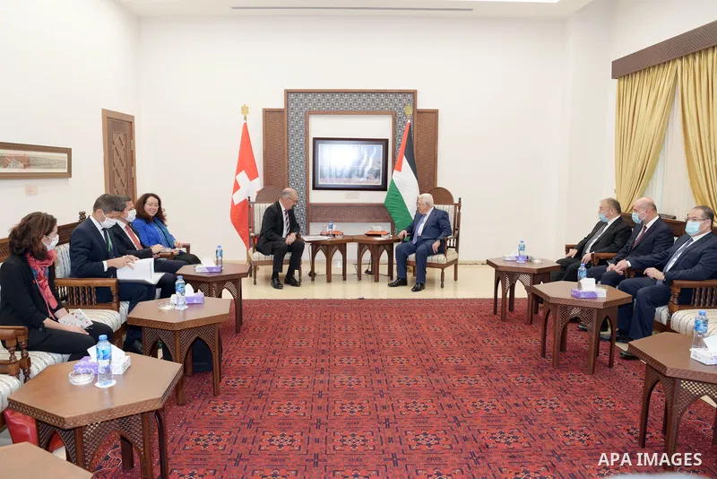 Palestinian president Mahmoud Abbas meets with Swiss Confederation President Guy Parmelin, in the West Bank city of Ramallah on October 28, 2021. Photo by Thaer Ganaim