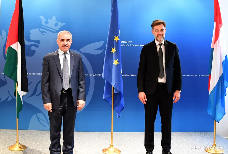 Palestinian Prime Minister Mohammed Ishtayeh meets with Minister of Development Cooperation, Humanitarian Affairs and Economy of Luxembourg Franz Vayot, in Luxembourg, on October 28, 2021. Photo by Prime Minister Office