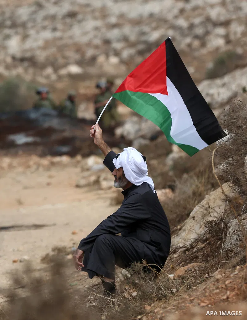 Palestinian protesters clash with Israeli forces during a protest against Israeli settlements, in Beit Dajan, in the West Bank city of Nablus on October 29, 2021. Photo by Stringer