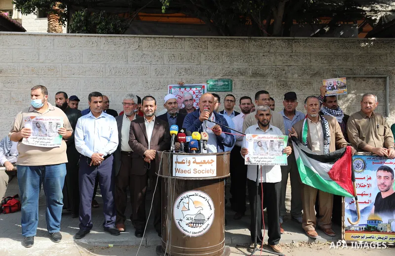 Palestinians take part in a protest in solidarity with prisoners on hunger strike at Israeli jails, in front of Red Cross office in Gaza city on November 1, 2021. President Mahmoud Abbas has asked the head of the Palesti...