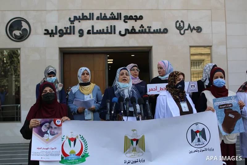 Palestinian women take part in a protest to show solidarity with prisoner Anhar al-Deek, in Gaza city, on September 02, 2021. Anhar al-Deek, a 25-year-old Palestinian prisoner, is getting closer to giving birth in an Isr...