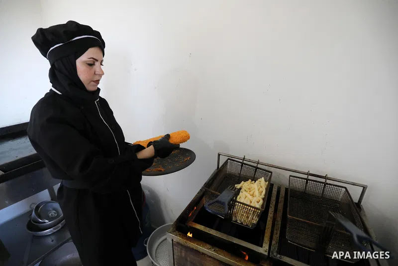 Two female Palestinian graduates, Heba Al-Hallaq, 32, and Heba Al Qudra, 22, open their own restaurant, to face unemployment in Khan Younis in the southern Gaza strip, on September 8, 2021. Gaza’s 2-million population re...