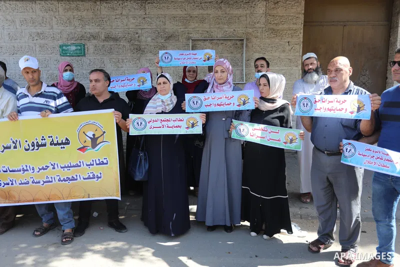 Palestinians take part in a protest in support of prisoners held in Israeli jails, in front of Red cross in Gaza city, September 9, 2021. In a step seen as vengeance following the escape yesterday of six Palestinian resi...