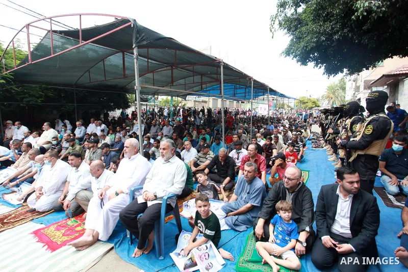 Palestinians attend Friday prayer in solidarity with prisoners in Israeli jails, in front of Red cross office, in Gaza city, on September 10, 2021. Israeli troops have arrested at least six family members in the West Ban...