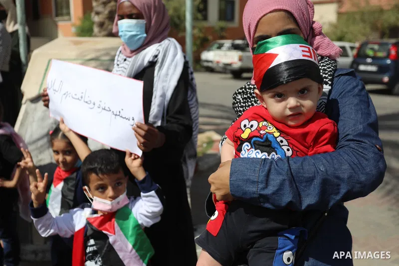Palestinian children take part in a protest following the arrest of 4 of 6 fugitives from Gilboa jailbreak now in Israeli custody, in Deir Al-Balah in the center of Gaza strip, on 11 Sebtember 2021. Two more of the six G...