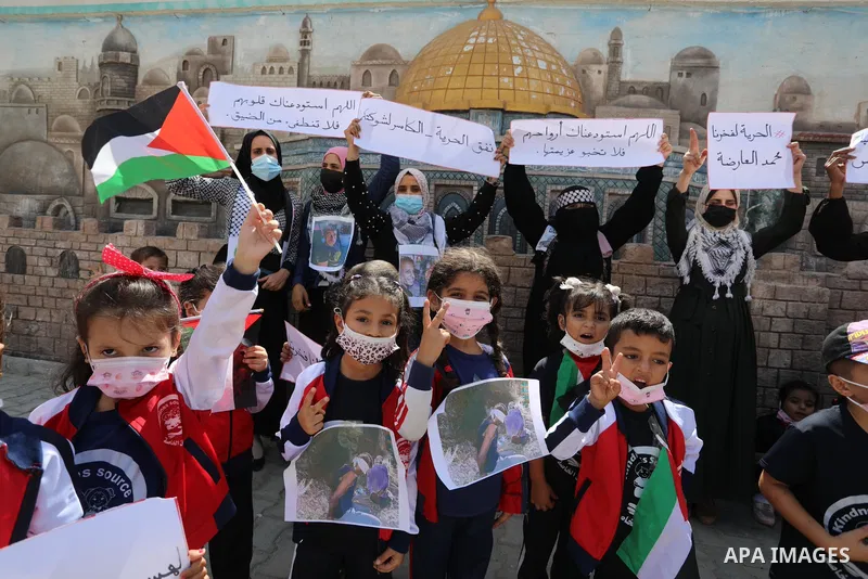 Palestinian children take part in a protest following the arrest of 4 of 6 fugitives from Gilboa jailbreak now in Israeli custody, in Deir Al-Balah in the center of Gaza strip, on 11 Sebtember 2021. Two more of the six G...