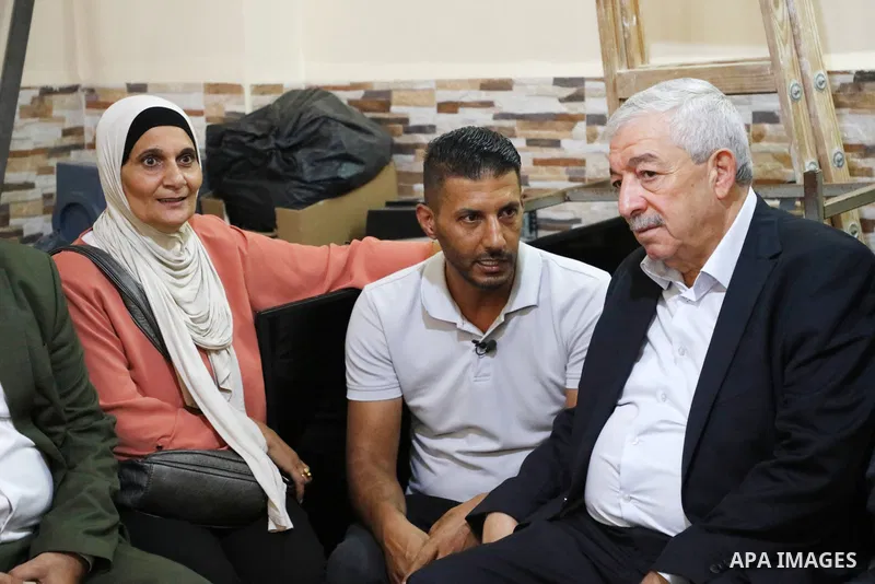 Members of the revolutionary council of the Fatah movement visit the family of the Palestinian Zakaria Zubeidi, who was arrested following his escape from Gilboa prison in the West Bank city of Jenin on September 13, 202...
