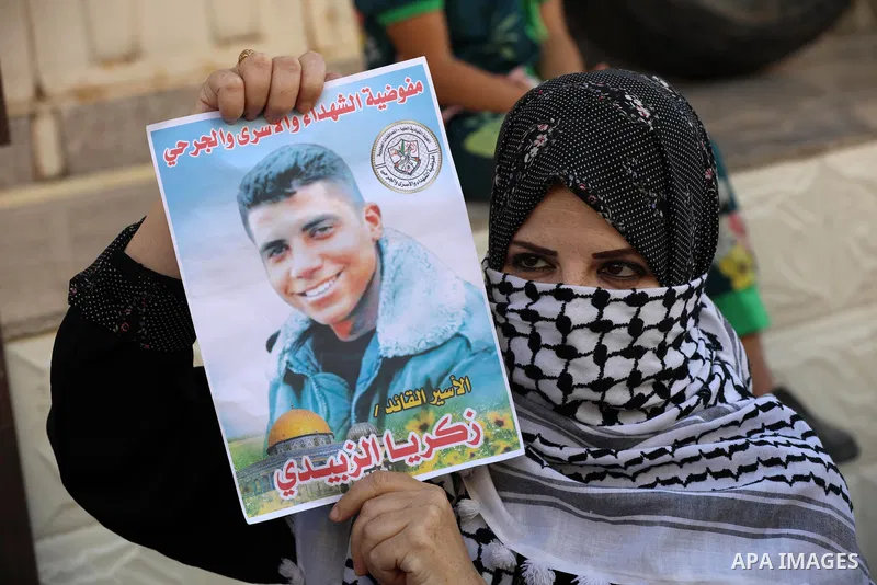 Palestinians take part in a protest against the United States and UNRWA signing a Framework for Cooperation, in Gaza city on September 14, 2021. The Framework for Cooperation states, “The US will not make any contributio...