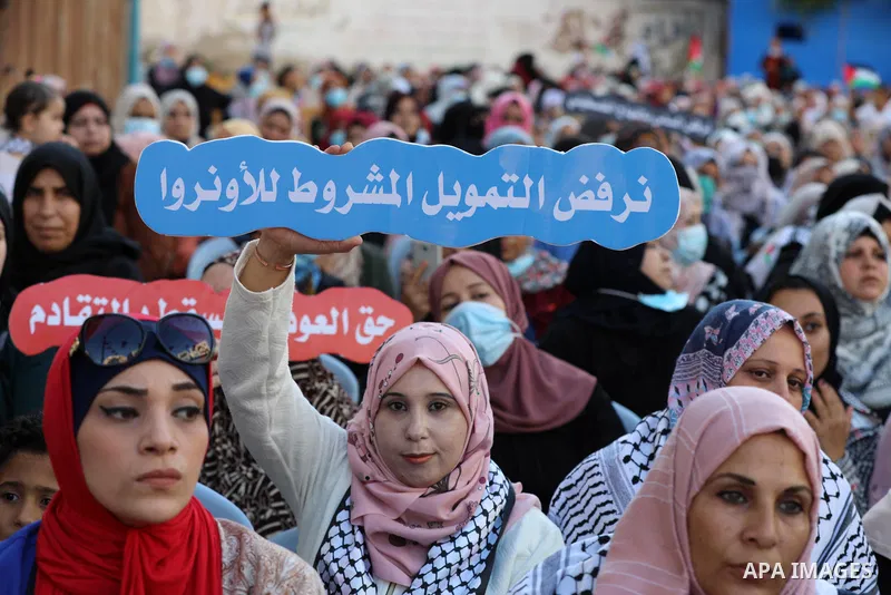 Palestinians take part in a protest against the United States and UNRWA signing a Framework for Cooperation, in Gaza city on September 14, 2021. The Framework for Cooperation states, “The US will not make any contributio...