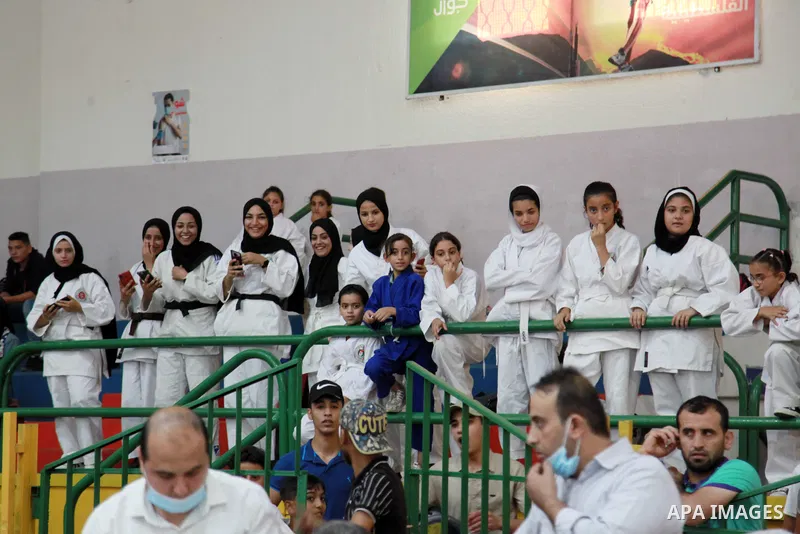 Palestinian players fight during a local Judo Championship, in Gaza city on September 19, 2021. Judo is generally categorized as a modern Japanese martial art, which has since evolved into an Olympic and Paralympic event...