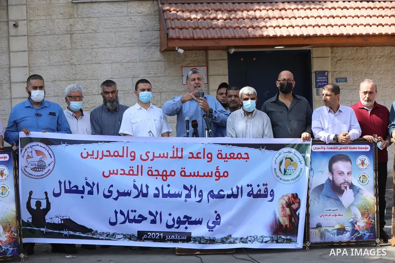 Palestinians take part in a protest to solidarity with prisoners held in Israeli jalis, in front of the headquarters of the High Commissioner, in Gaza city on September 21 2021. There are around 4,850 Palestinian detaine...