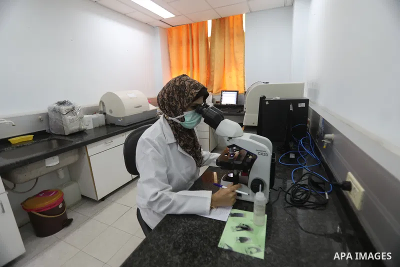 Palestinian doctors work at European Gaza Hospital in Rafah in the southern of Gaza Strip, on September 21, 2021. Fourteen people have died of coronavirus in Palestine in the last 24 hours while 1323 new cases were recor...