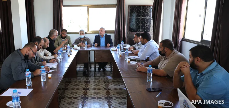 Palestinian factions attend a press conference on the latest political and national developments, in Gaza city on September 21 2021. "We need one billion U.S. dollars to rebuild the damage left during the latest wave of...