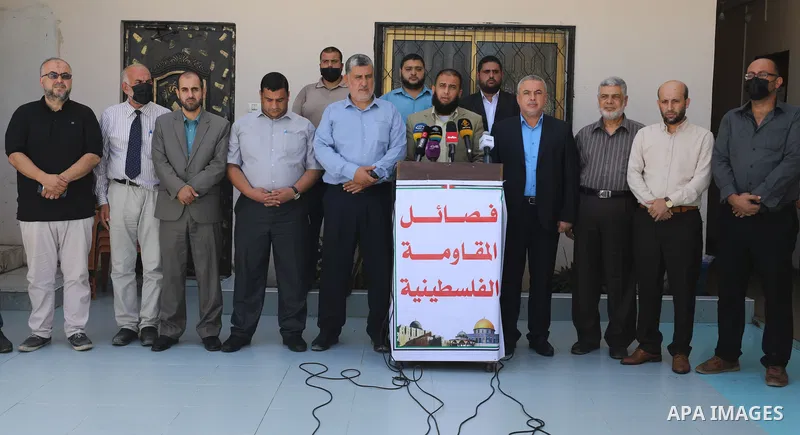 Palestinian factions attend a press conference on the latest political and national developments, in Gaza city on September 21 2021. "We need one billion U.S. dollars to rebuild the damage left during the latest wave of...