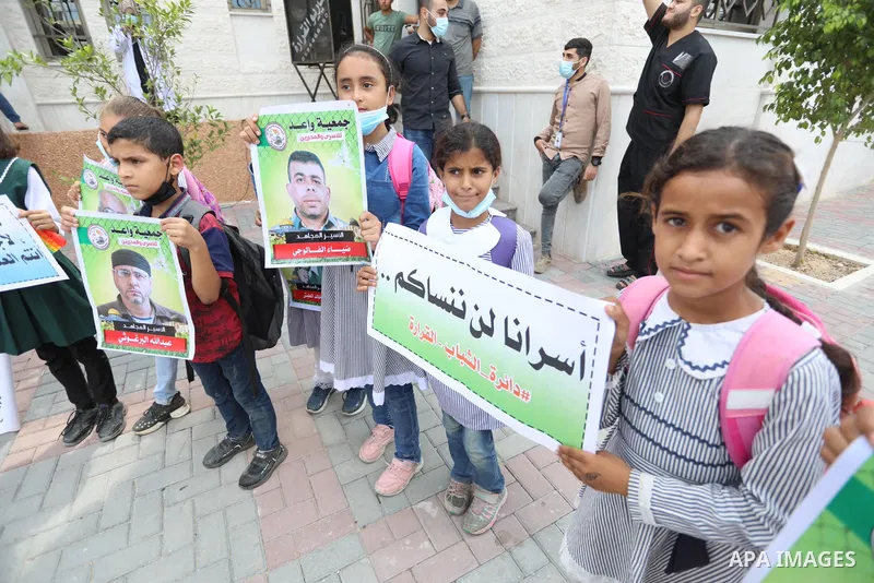 Palestinians take part in a protest to show solidarity with prisoners in Israeli Jails, in Khan Younis in the southern of Gaza strip, on September 23, 2021. The Prisoners’ Affairs Commission announced in a press statemen...