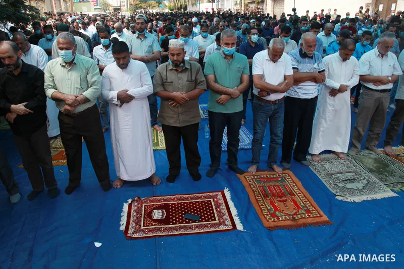 Palestinians attend Friday prayer in solidarity with prisoners at Israeli jails, in front of Red Cross office in Gaza city on September 24, 2021. A Palestinian ex-prisoner Wednesday night died in a Ramallah hospital afte...