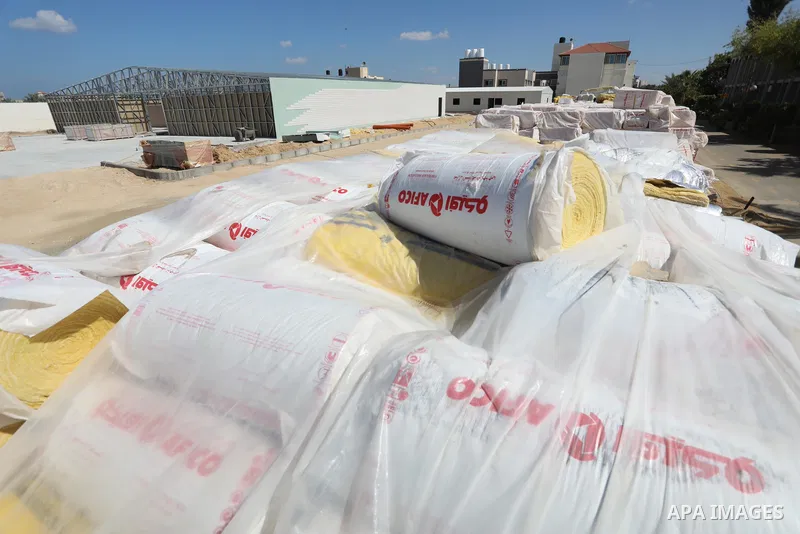 Palestinians work on the building the field hospital to house coronavirus disease (COVID-19), patients at European Gaza Hospital in Rafah in the southern of Gaza Strip, on September 25, 2021. COVID-19 claimed the life of...