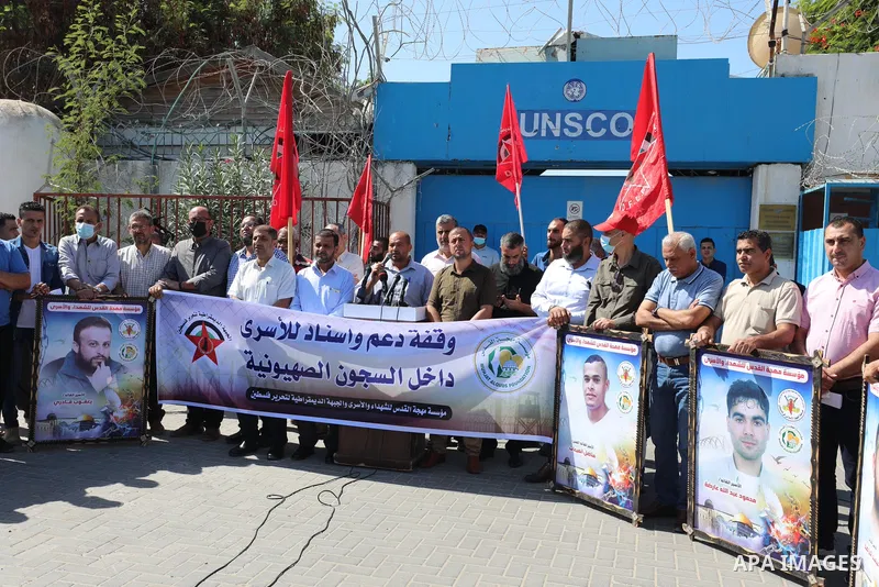 Palestinians take part in a protest to show solidarity with prisoners in Israeli Jails, in front of the UNESCO headquarters in Gaza city, on Sebtember 26, 2021. Palestinian administrative detainees believe hunger strike...