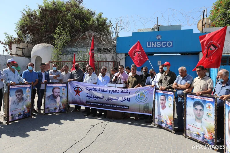 Palestinians take part in a protest to show solidarity with prisoners in Israeli Jails, in front of the UNESCO headquarters in Gaza city, on Sebtember 26, 2021. Palestinian administrative detainees believe hunger strike...