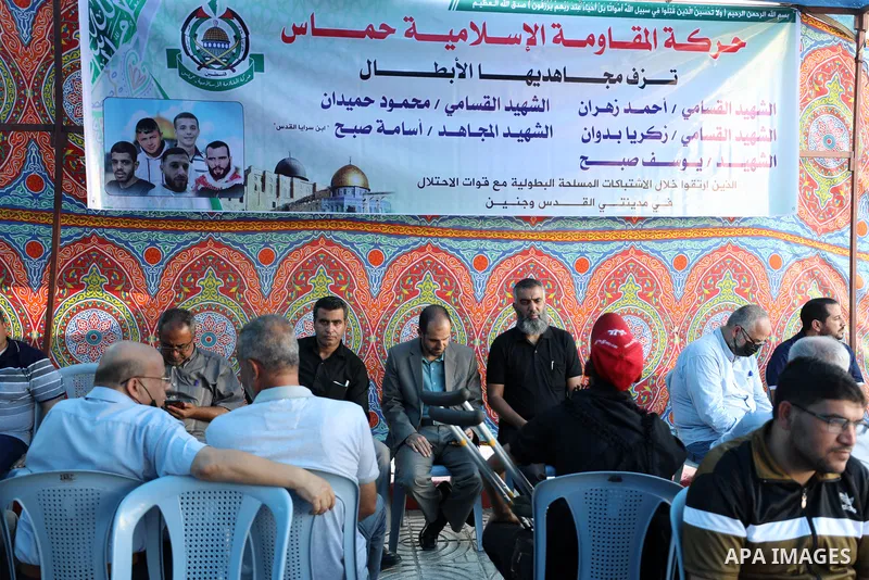 Palestinians take part in a mourning tent of five Palestinians killed by Israeli forces, in Gaza city on September 26, 2021. An Israeli operation to dismantle a Hamas Islamist cell in the West Bank sparked fierce gun bat...