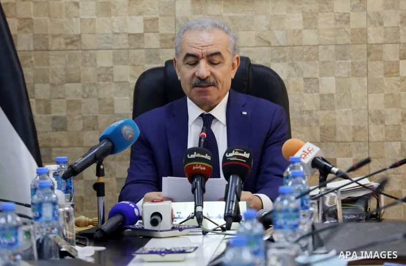 Palestinian Prime Minister Mohammed Ishtayeh heads the weekly cabinet meeting in the West Bank town of Hebron on September 27, 2021. Photo by Mamoun Wazwaz