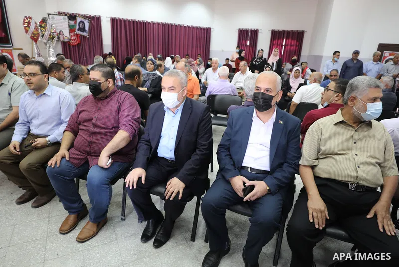 Palestinians attend a celebrate marking the release of Khaleda Jarrar, a leader of Popular Front for the Liberation of Palestine (PFLP), in Gaza city, on September 29, 2021. Jarrar, 58, a senior leader in the Popular Fro...