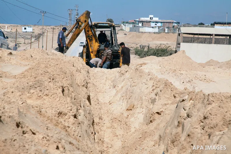 Egyptian workers and bulldozers sent from Egypt start rehabilitation al-Rasheed street in Gaza city, on September 29, 2021. Egyptian president abdel Fattah el-Sisi promised $500 million for rebuilding Gaza, and gave dire...