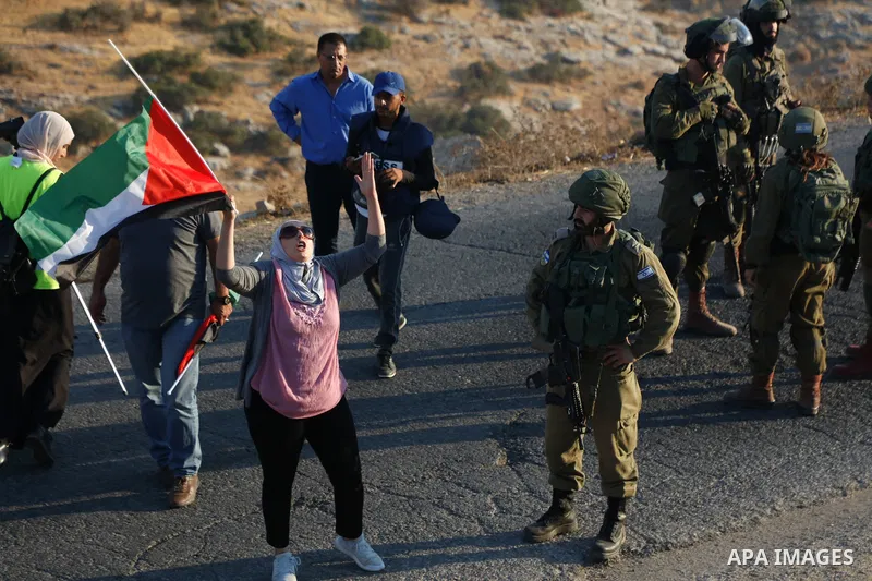 Israeli soldiers clash with Palestinian protesters near a previously-evacuated Israeli army camp that was taken over by settlers, at Tayasir checkpoint east of Tubas in the north of the occupied West Bank, on July 31, 20...