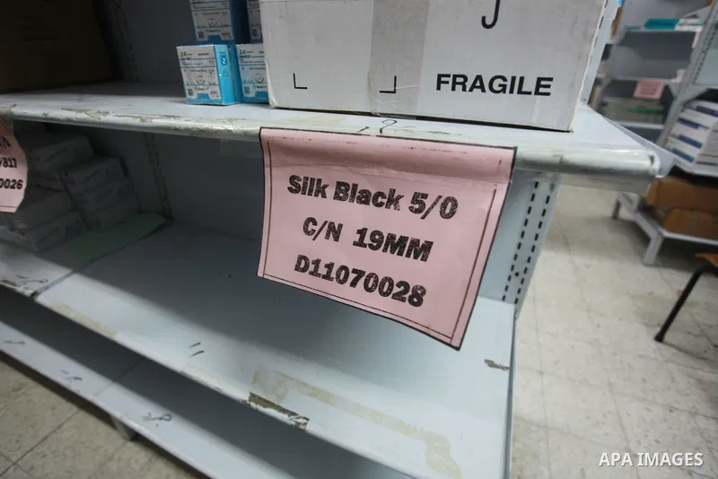 Employees of the Palestinian Ministry of Health in the Gaza Strip count the missing medicines due to Israel's continued closure of the border crossings, inside the warehouses of the Ministry of Health in Gaza City, on Au...